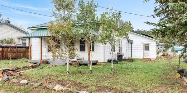 Image 2: Flat, grassy yard with aspens Image 2: Flat, grassy yard with aspens