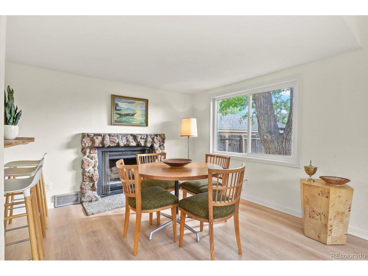 Image 4: Dining room with original wood burning fireplace Image 4: Dining room with original wood burning fireplace