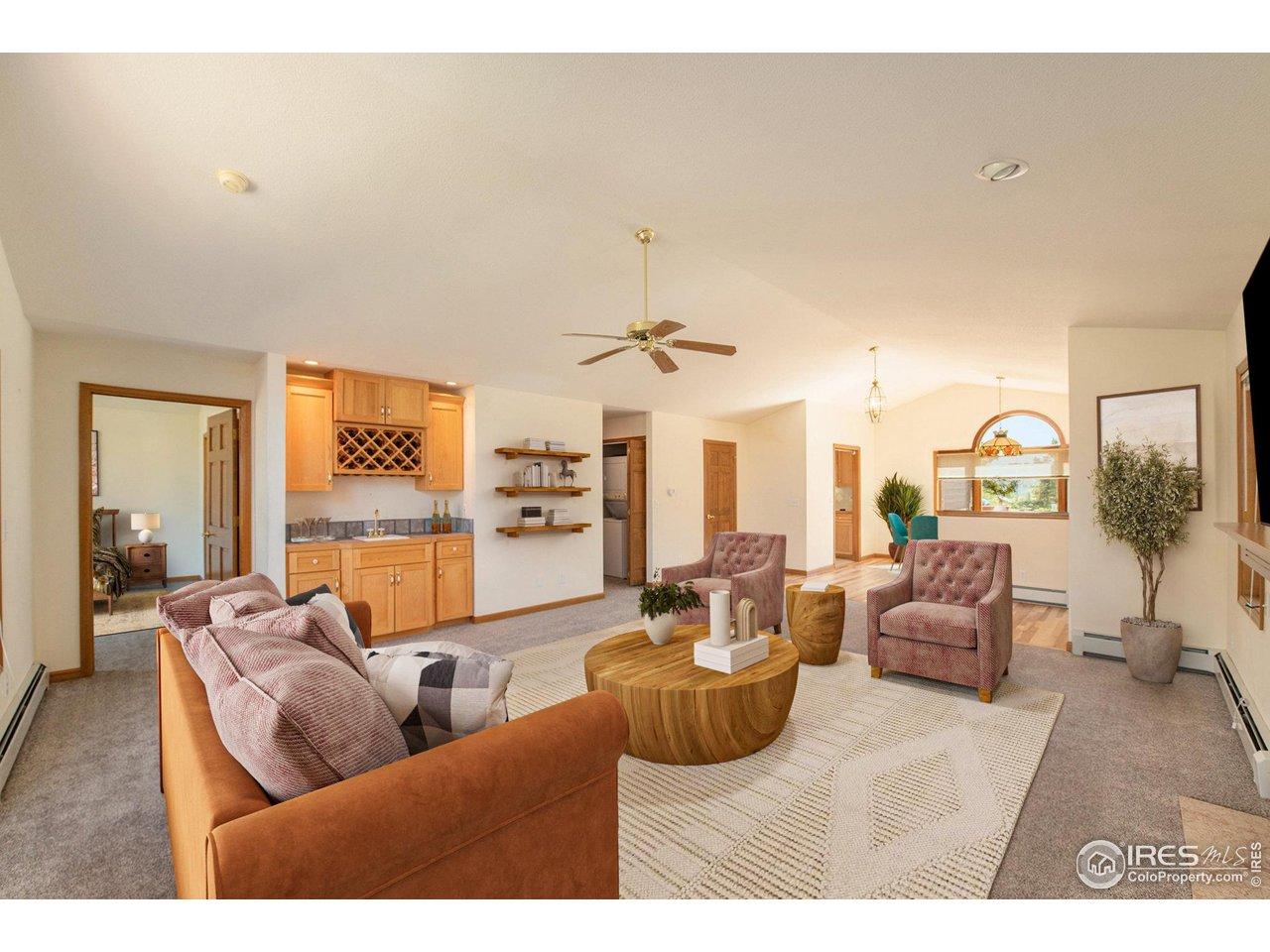 Image 3: Living room with wet bar. (Digitally furnished). Image 3: Living room with wet bar. (Digitally furnished).