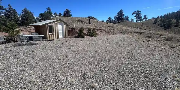 Image 3: flat grade, shed and hilltop view