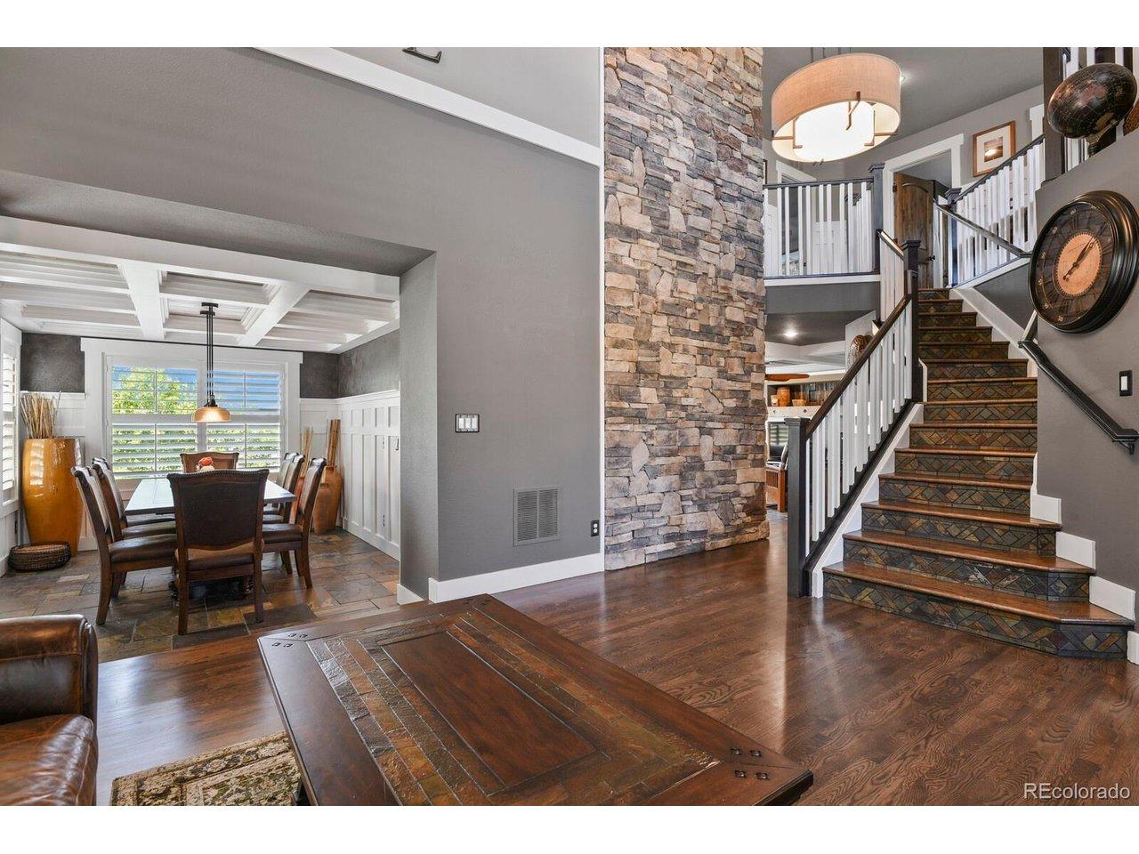 Image 3: Living room, formal dining and beautiful staircase at front door Image 3: Living room, formal dining and beautiful staircase at front door