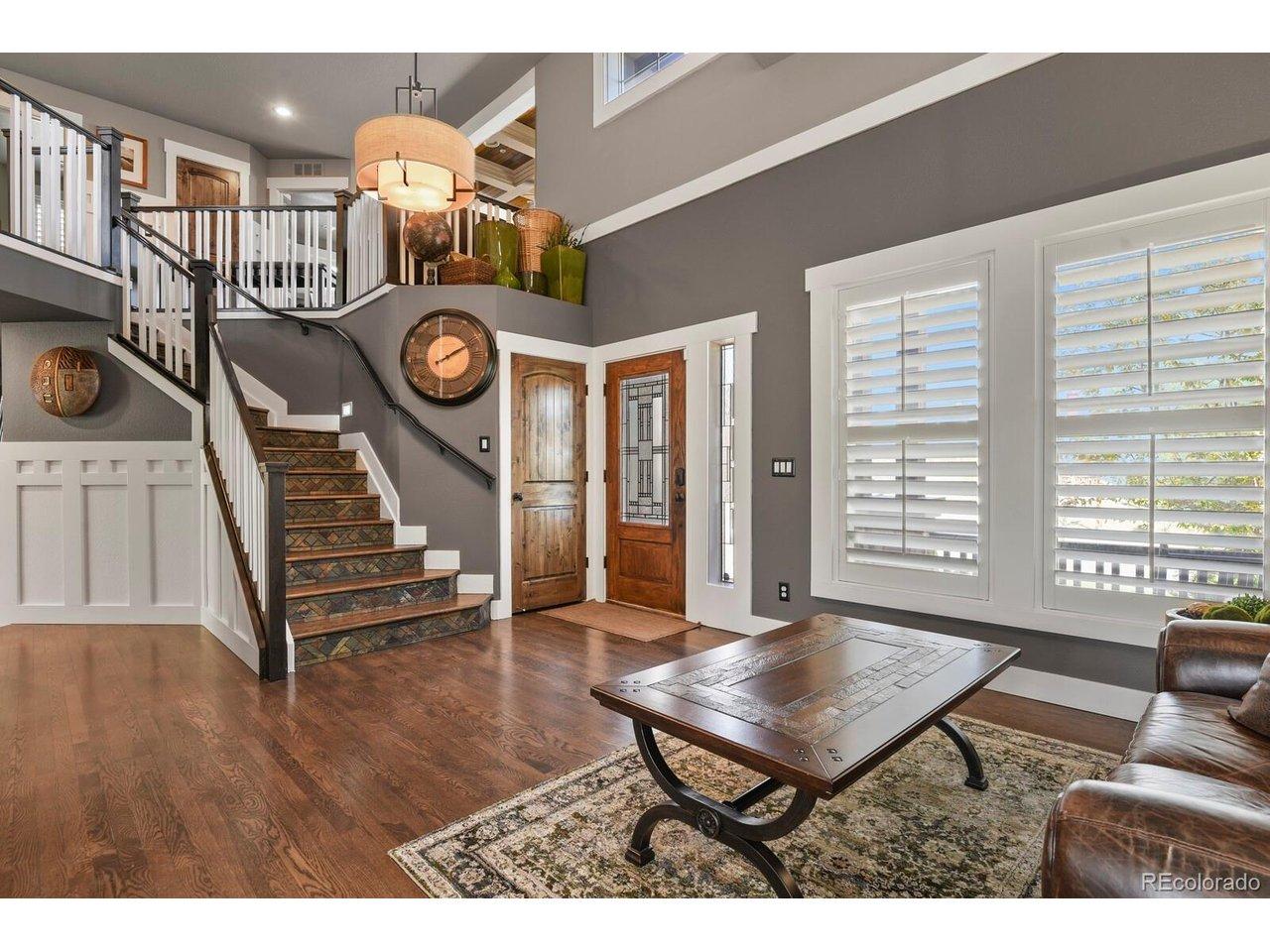 Image 4: Living room and view of upstairs from front door Image 4: Living room and view of upstairs from front door