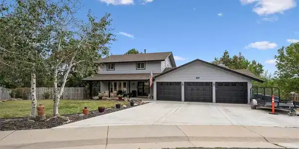 Image 4: Three-car garage with plenty of additional off-street parking. Image 4: Three-car garage with plenty of additional off-street parking.