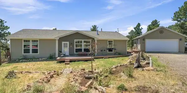 Image 3: Nestled on a flat, generous and useable 1.1 acre lot