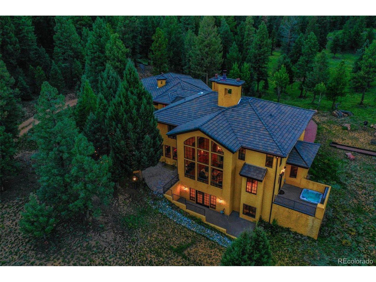 Image 2: Aerial view at dusk of the back of the structure.
