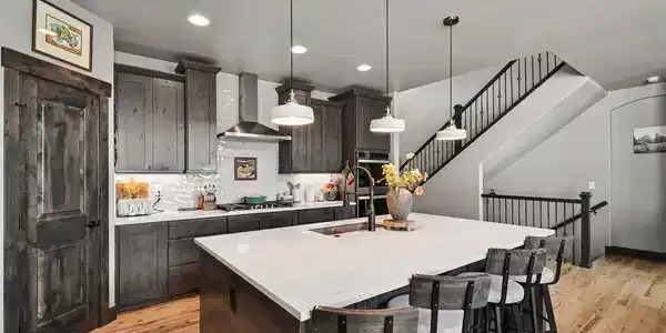 Image 2: Gourmet kitchen with double ovens, a gas stove, large island, and a big pantry!