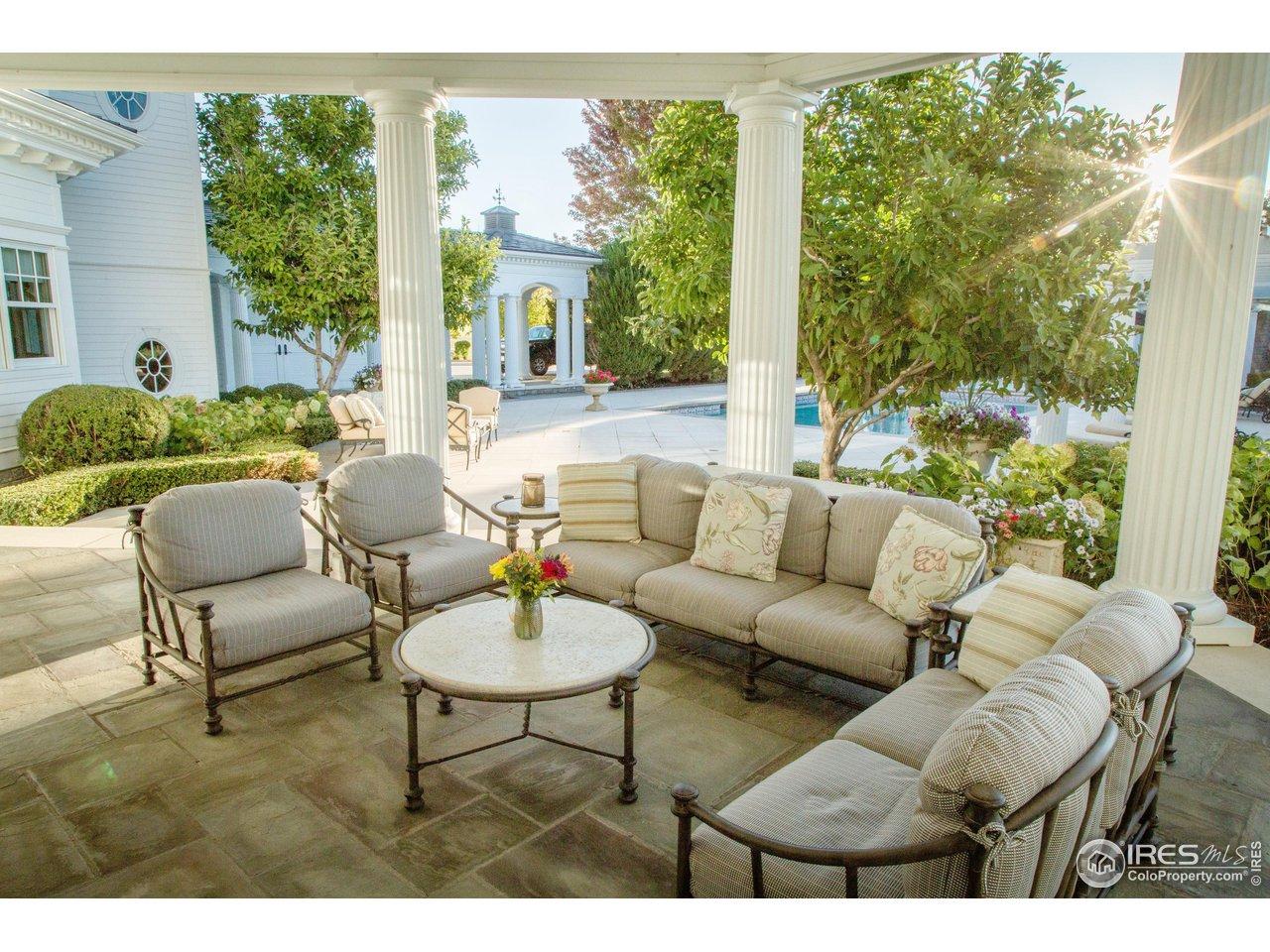 Image 4: Covered Patio Adjacent to Pool