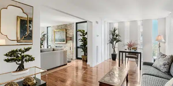 Image 3: Sitting room with floor-to-ceiling windows creating a spectacular connection to the adjacent sitting room and landscape beyond. Image 3: Sitting room with floor-to-ceiling windows creating a spectacular connection to the adjacent sitting room and landscape beyond.