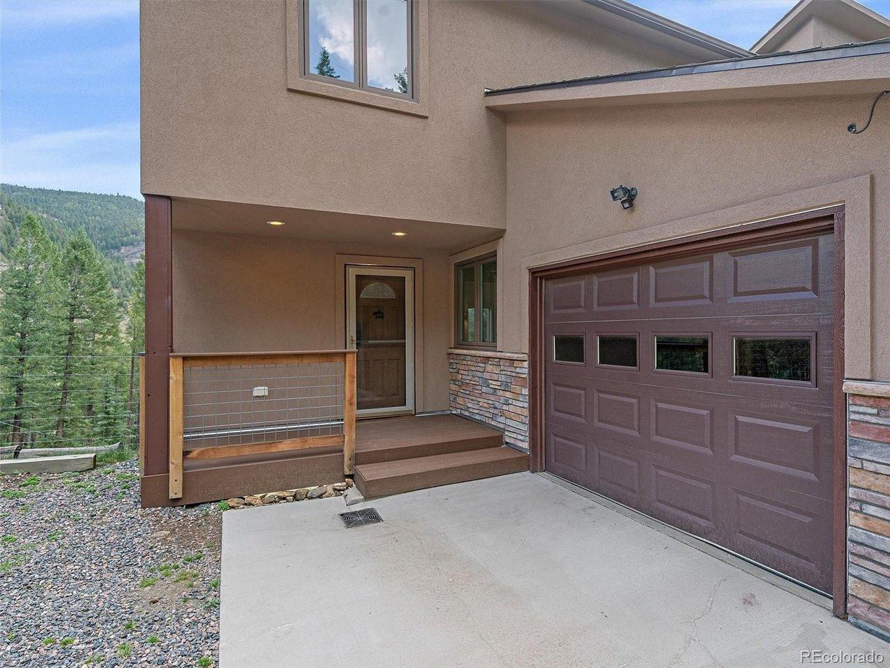 Image 3: Newer insulated garage door... Image 3: Newer insulated garage door...