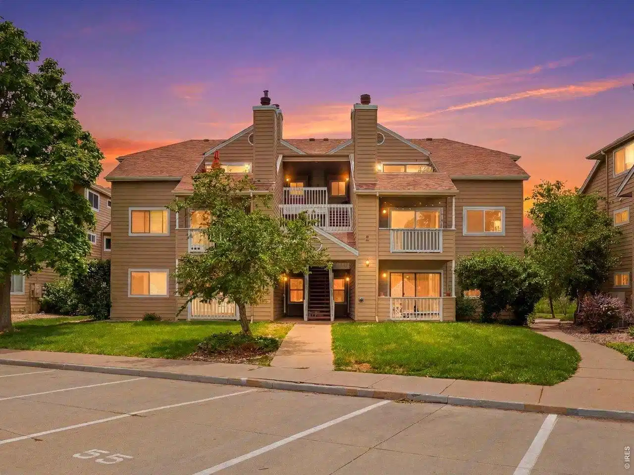 Image 1: Welcome home to 4945 Twin Lakes #46! A beautifully updated second-floor condo in the coveted Twin Lakes community.