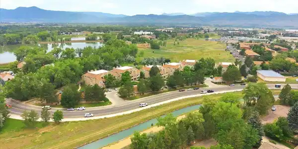 Image 3: Nestled beside open space, scenic trails, Twin Lakes, and breathtaking Front Range views.