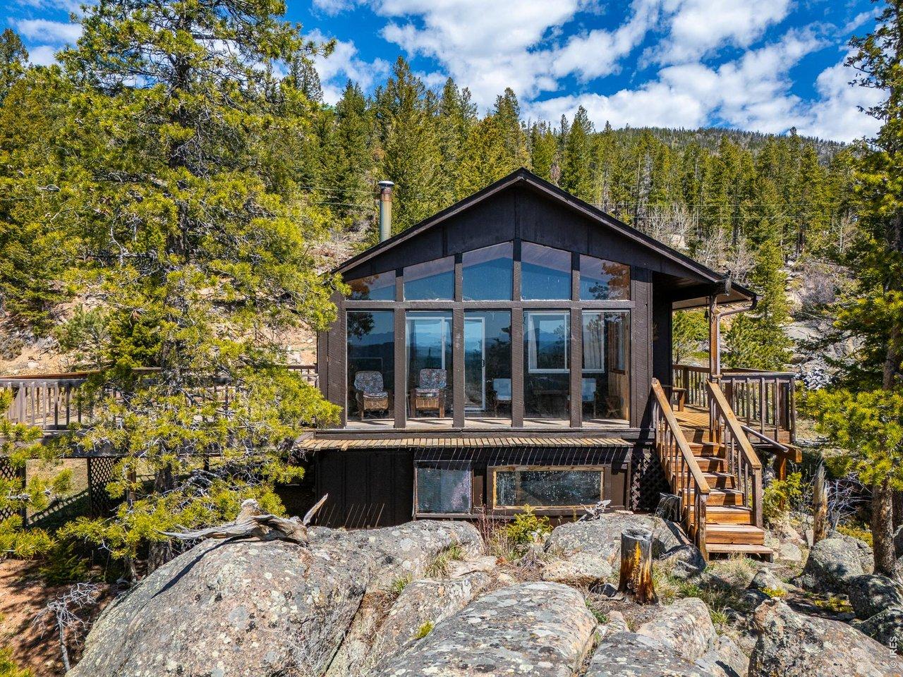 Image 3: 194 Mattapony Way.  Quaint mountain getaway with 2 bedrooms, 1 bath, sunroom & wrap around decks.