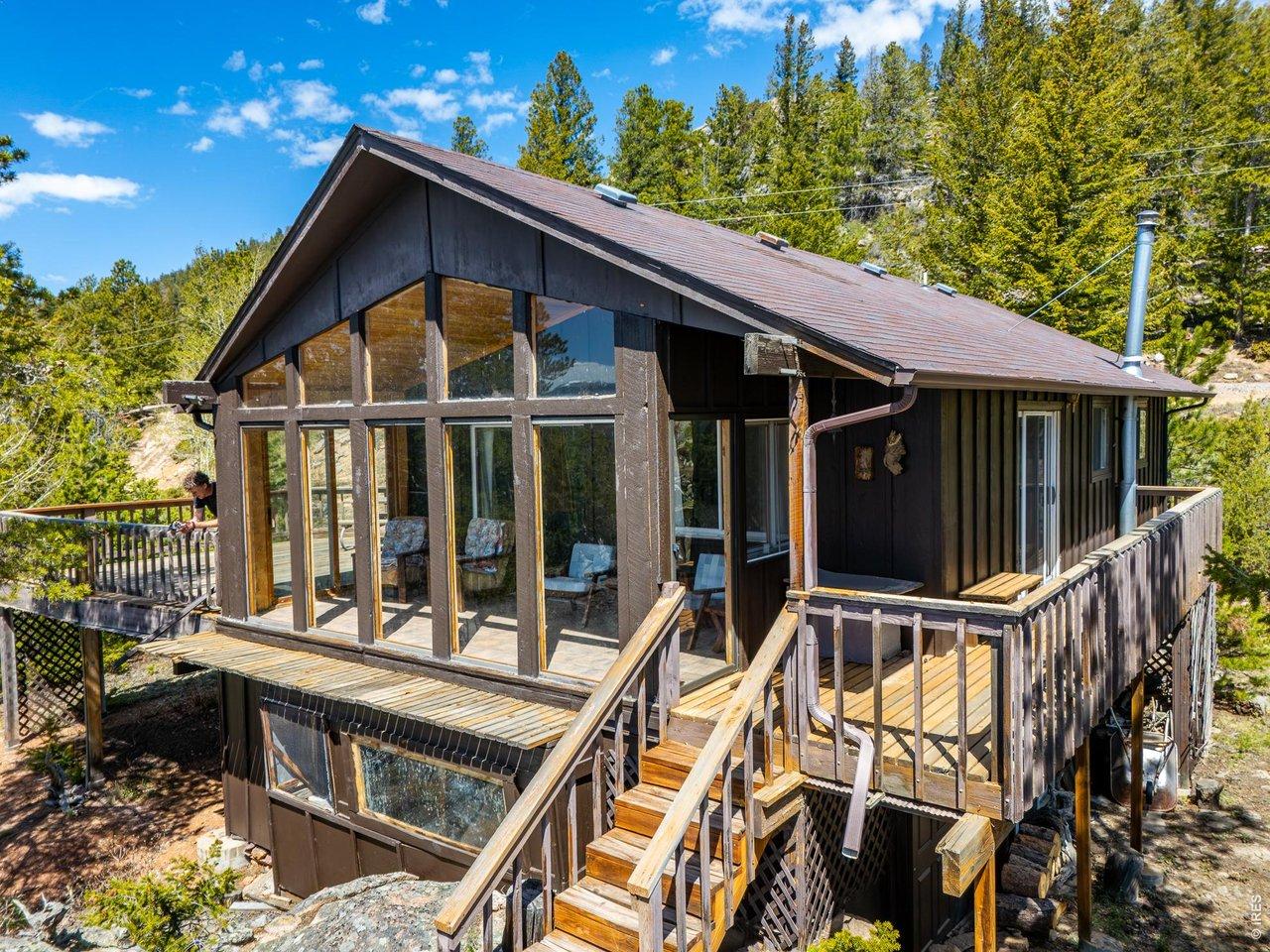 Image 4: 194 Mattapony Way.  Quaint mountain getaway with 2 bedrooms, 1 bath, sunroom & wrap around decks.