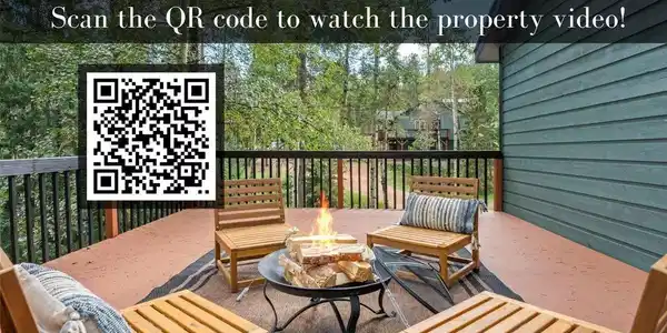 Image 3: Gather around the fire on this covered patio, where cozy seating and a crackling firepit set the scene for evenings that linger. Scan the code above to see the full property come to life on video. Image 3: Gather around the fire on this covered patio, where cozy seating and a crackling firepit set the scene for evenings that linger. Scan the code above to see the full property come to life on video.
