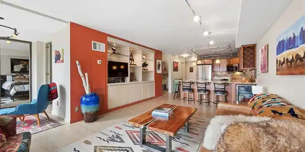 Image 4: Living room with custom built-ins. Image 4: Living room with custom built-ins.