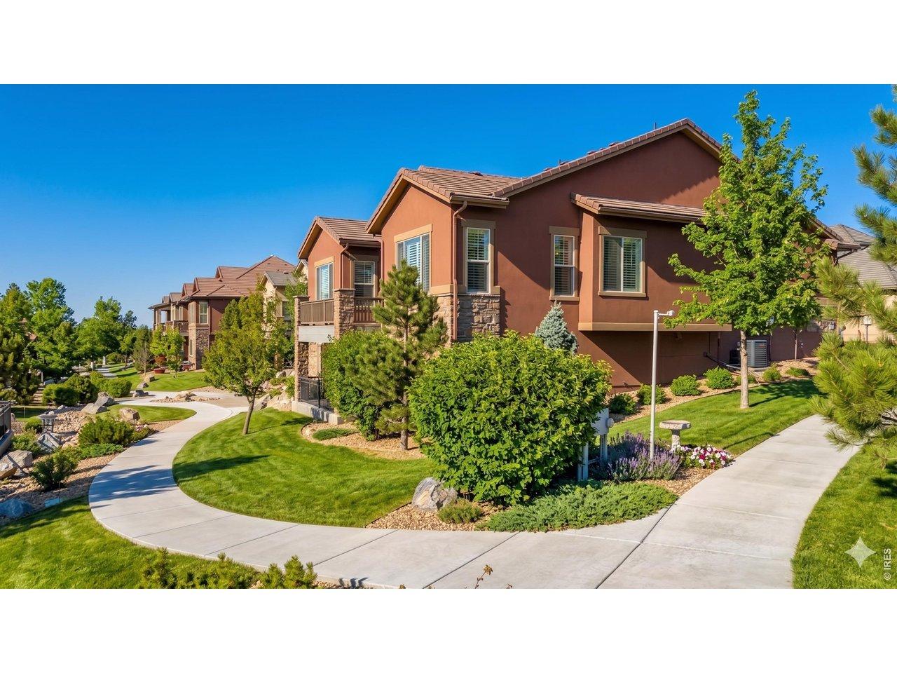 Image 2: Coveted corner lot backing the walking path and providing convenient guest parking (landscape enhanced)