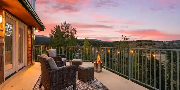 Image 3: Colorado sunsets put on quite a show from this expansive rooftop deck