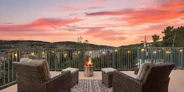 Image 4: End the day outside with mountain air, wide-open views and a front-row seat for sunset