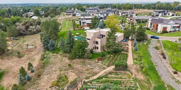 Image 2: View to the west over the one-acre-plus lot Image 2: View to the west over the one-acre-plus lot