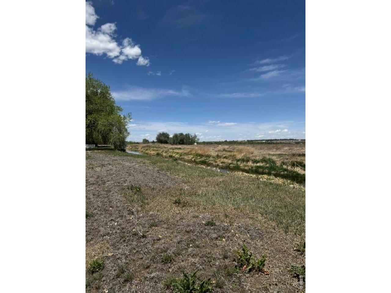 Image 3: Little Thompson ditch to the East with majestic views. Image 3: Little Thompson ditch to the East with majestic views.