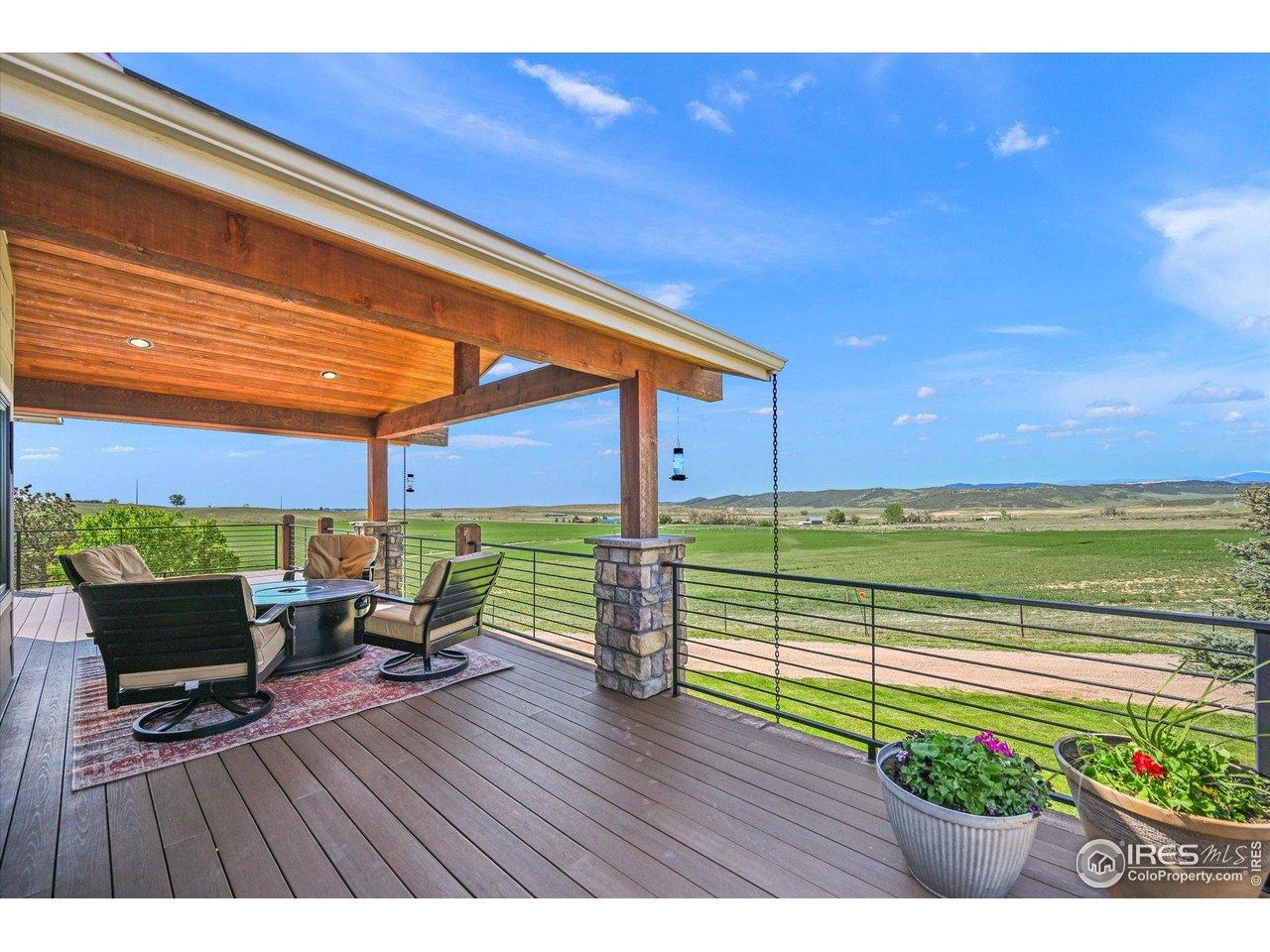 Image 3: Welcome home to your west-facing covered deck.