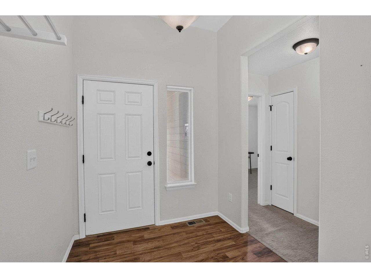 Image 4: Foyer - hallway to bedroom #2 & #3 and 2nd full bathroom Image 4: Foyer - hallway to bedroom #2 & #3 and 2nd full bathroom