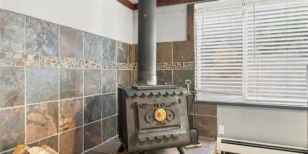 Image 3: Wood burning stove. Image 3: Wood burning stove.