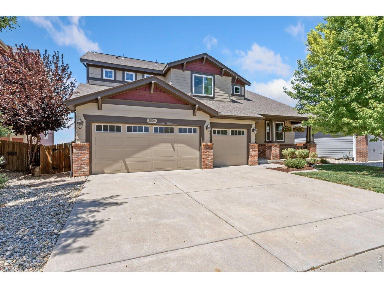 Image 2: Oversized Heated 3-Car Garage with Cabinets