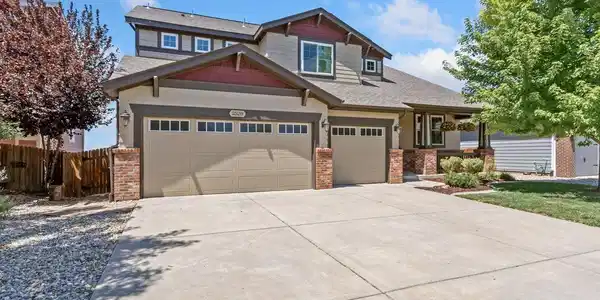 Image 2: Oversized Heated 3-Car Garage with Cabinets