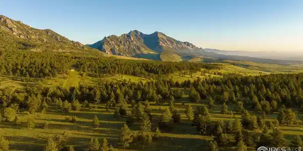 Image 3: Looking northwest towards the Flatirons from the ridge that the lot sits on.