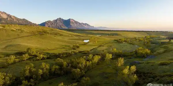 Image 3: Looking across the ranch towards the northwest with the designated homesite, Coal Creek Reserve, in the foreground, just to the east (right) on the bluff above Coal Creek.