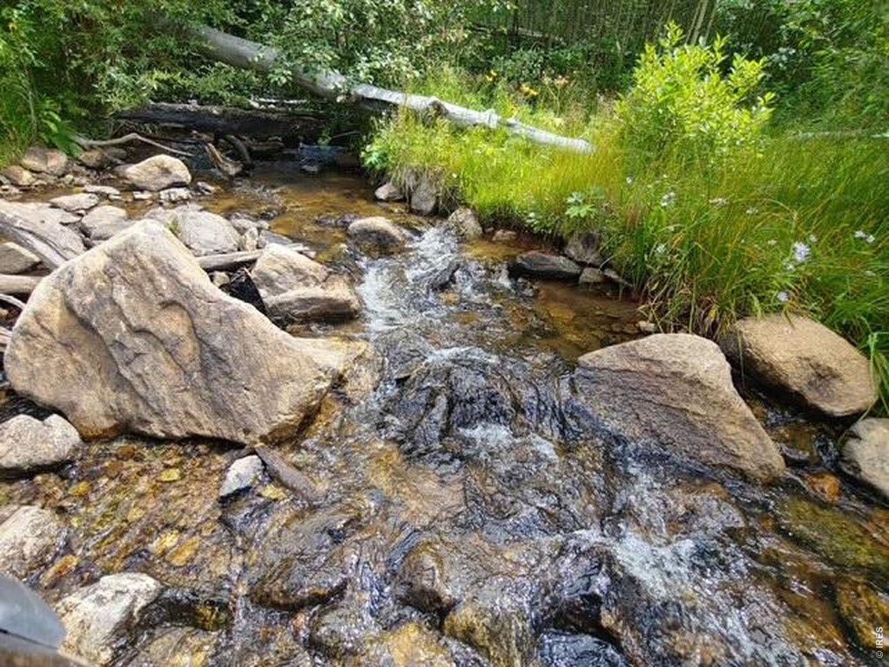 Image 3: Redstone Creek runs through the property