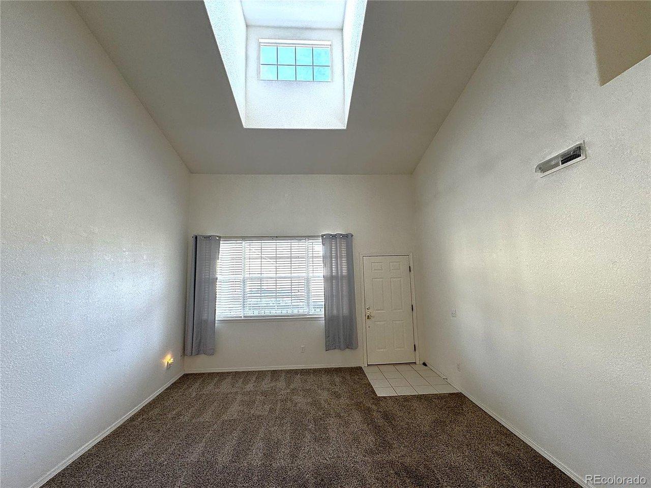 Image 3: High ceiling in Living Room with ample light from large Dormer Window Image 3: High ceiling in Living Room with ample light from large Dormer Window