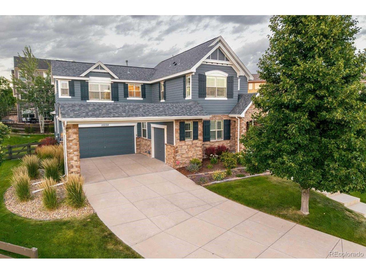 Image 3: 3 1/2 car split garages plus a large driveway Image 3: 3 1/2 car split garages plus a large driveway