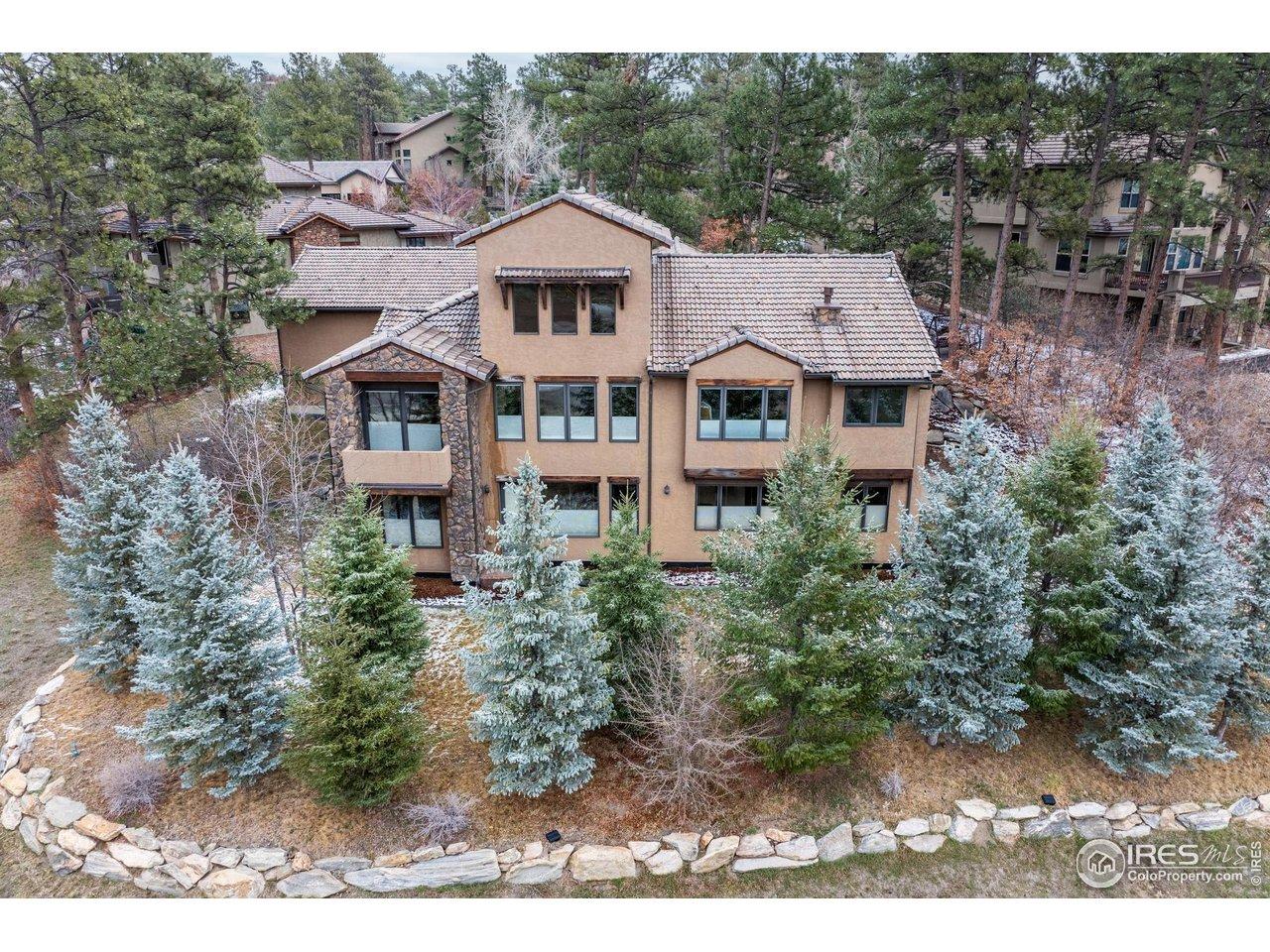 Image 2: Beautiful Colorado home nestled in the pines with large windows and endless natural light.