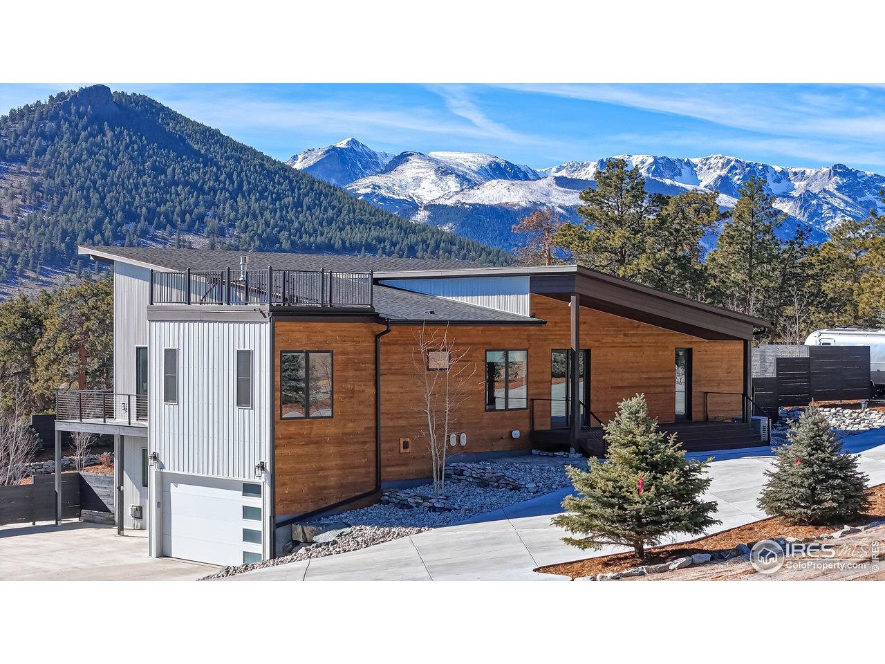 Image 1: Truly a spectacular mountain home with Continental Divide views. Image 1: Truly a spectacular mountain home with Continental Divide views.