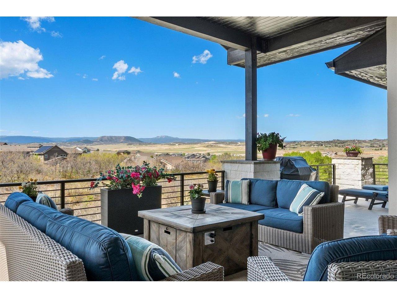 Image 3: Covered upper deck enjoys view of the mountains and green belt. Image 3: Covered upper deck enjoys view of the mountains and green belt.