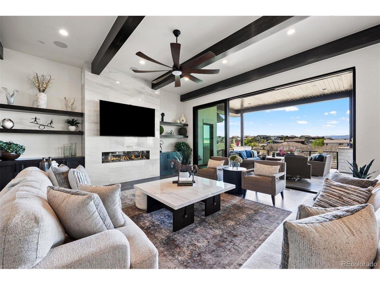 Image 4: Open great room expanded by oversized sliding glass doors to the deck. Image 4: Open great room expanded by oversized sliding glass doors to the deck.
