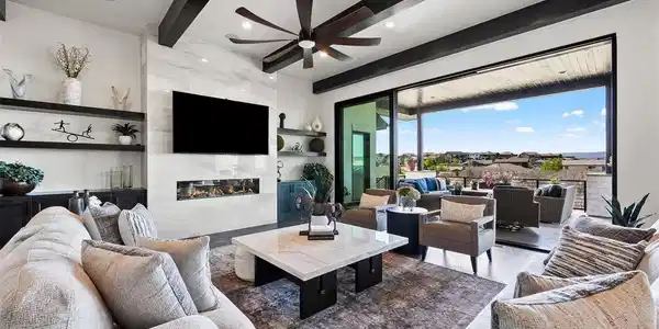 Image 4: Open great room expanded by oversized sliding glass doors to the deck. Image 4: Open great room expanded by oversized sliding glass doors to the deck.