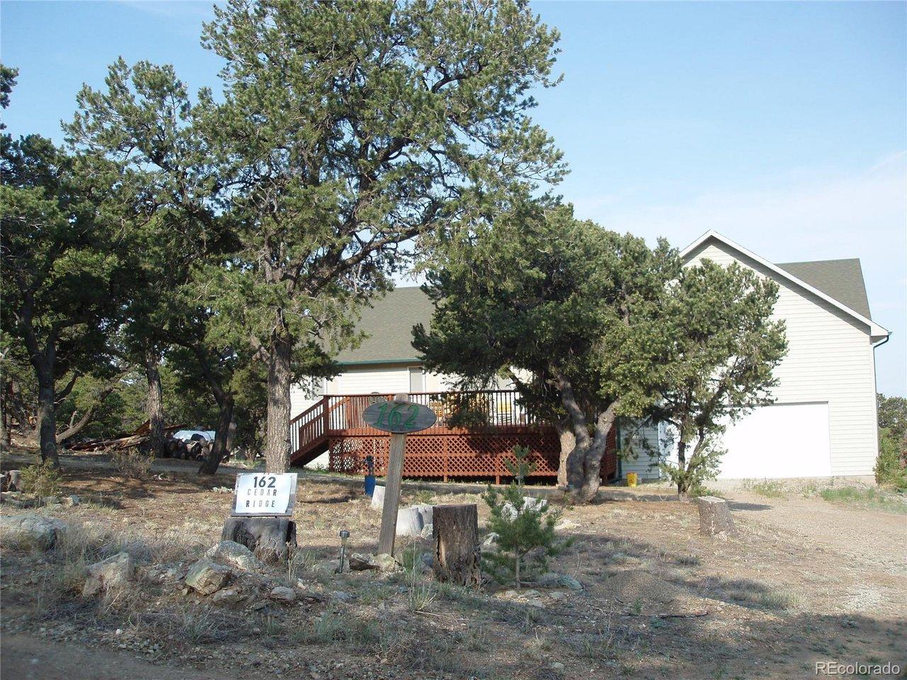 Image 3: The front of the house has nice pinon trees surrounding the home. Pinon nuts are a local favorite nut. You can pick your own crop. Image 3: The front of the house has nice pinon trees surrounding the home. Pinon nuts are a local favorite nut. You can pick your own crop.