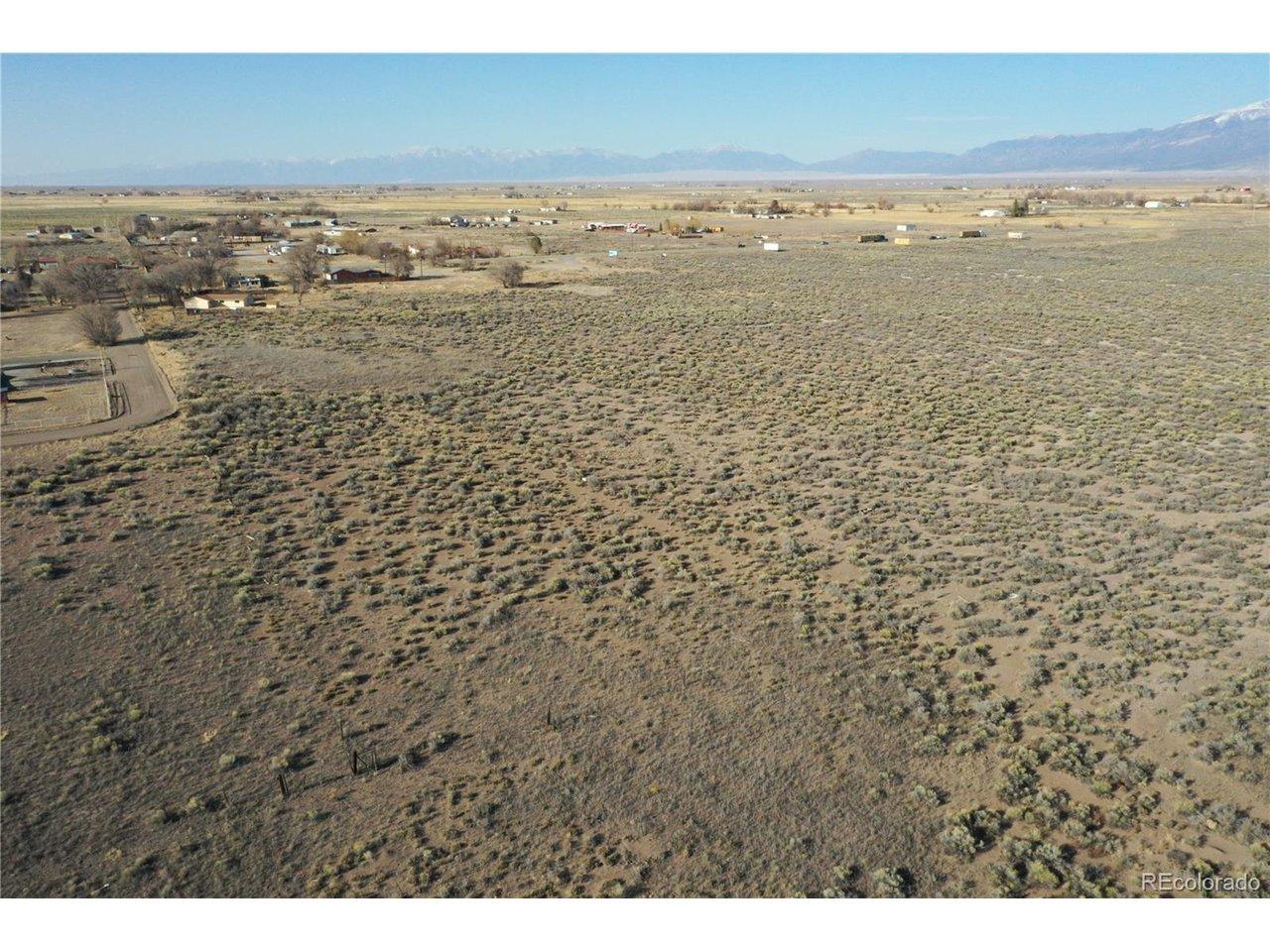 Image 3: Aerial view from the SW corner of the acres. This is a potential second entrance to the property. Image 3: Aerial view from the SW corner of the acres. This is a potential second entrance to the property.