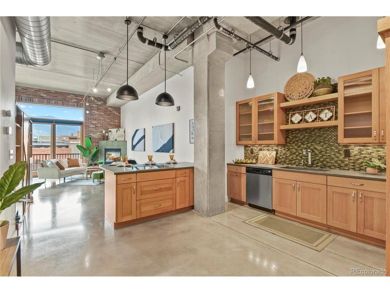 Image 3: Gourmet kitchen is appointed with slab slate countertops, quarter-sawn oak cabinetry, generous breakfast bar Image 3: Gourmet kitchen is appointed with slab slate countertops, quarter-sawn oak cabinetry, generous breakfast bar