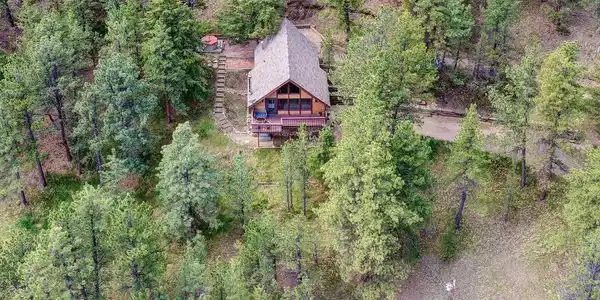 Image 3: Enjoy the tranquility of this secluded, forested setting on 2.63 private acres Image 3: Enjoy the tranquility of this secluded, forested setting on 2.63 private acres
