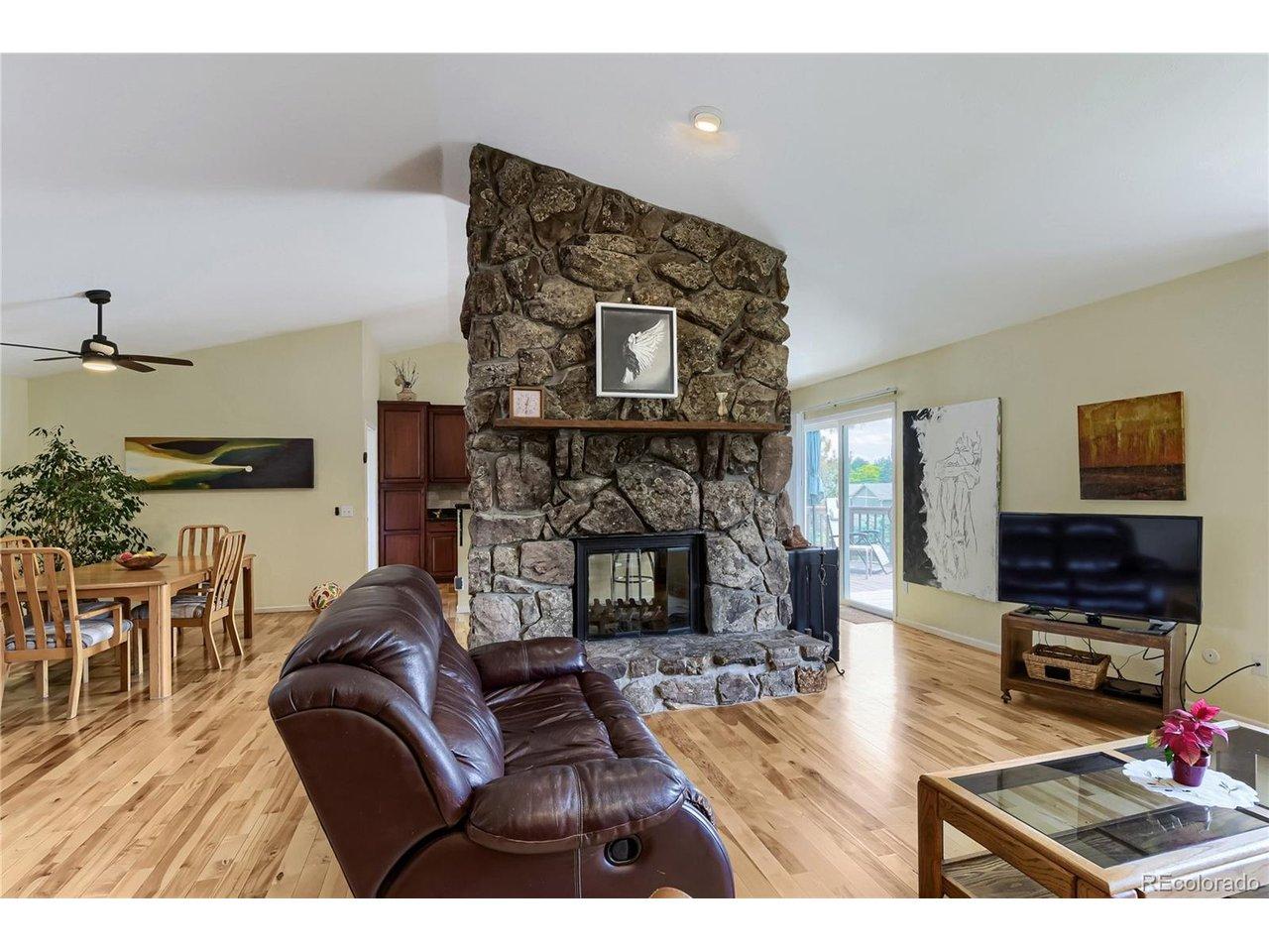 Image 4: Living Room Features 2-Sided Wood-Burning Fireplace Image 4: Living Room Features 2-Sided Wood-Burning Fireplace