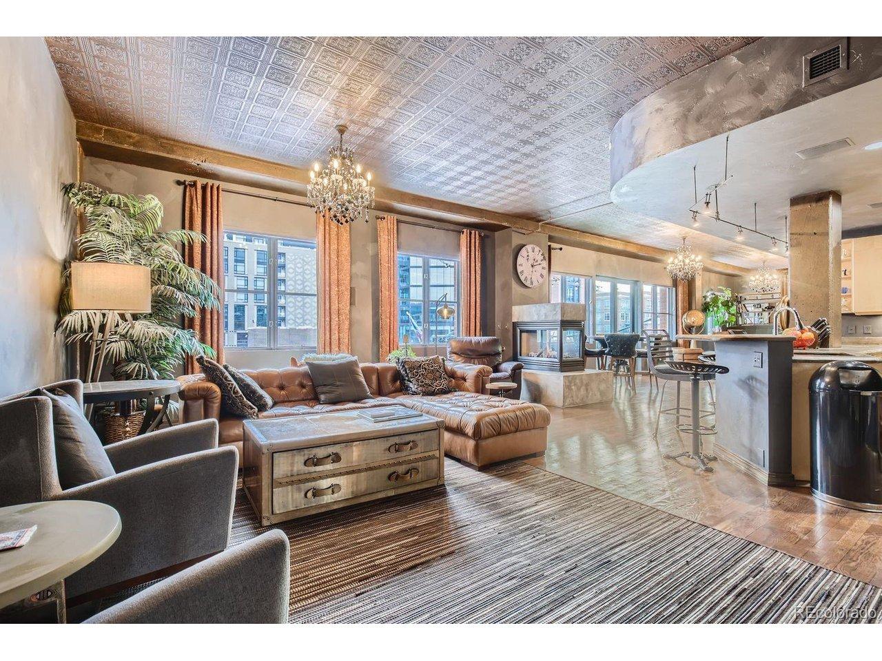 Image 1: Double sided fireplace in spacious living and dining area
