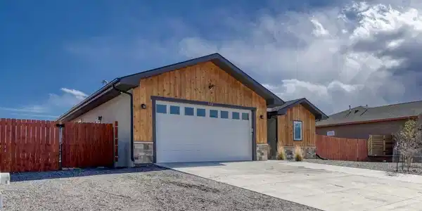 Image 2: 2 car garage offers plenty of space for parking your vehicles and storing your grown up toys Image 2: 2 car garage offers plenty of space for parking your vehicles and storing your grown up toys