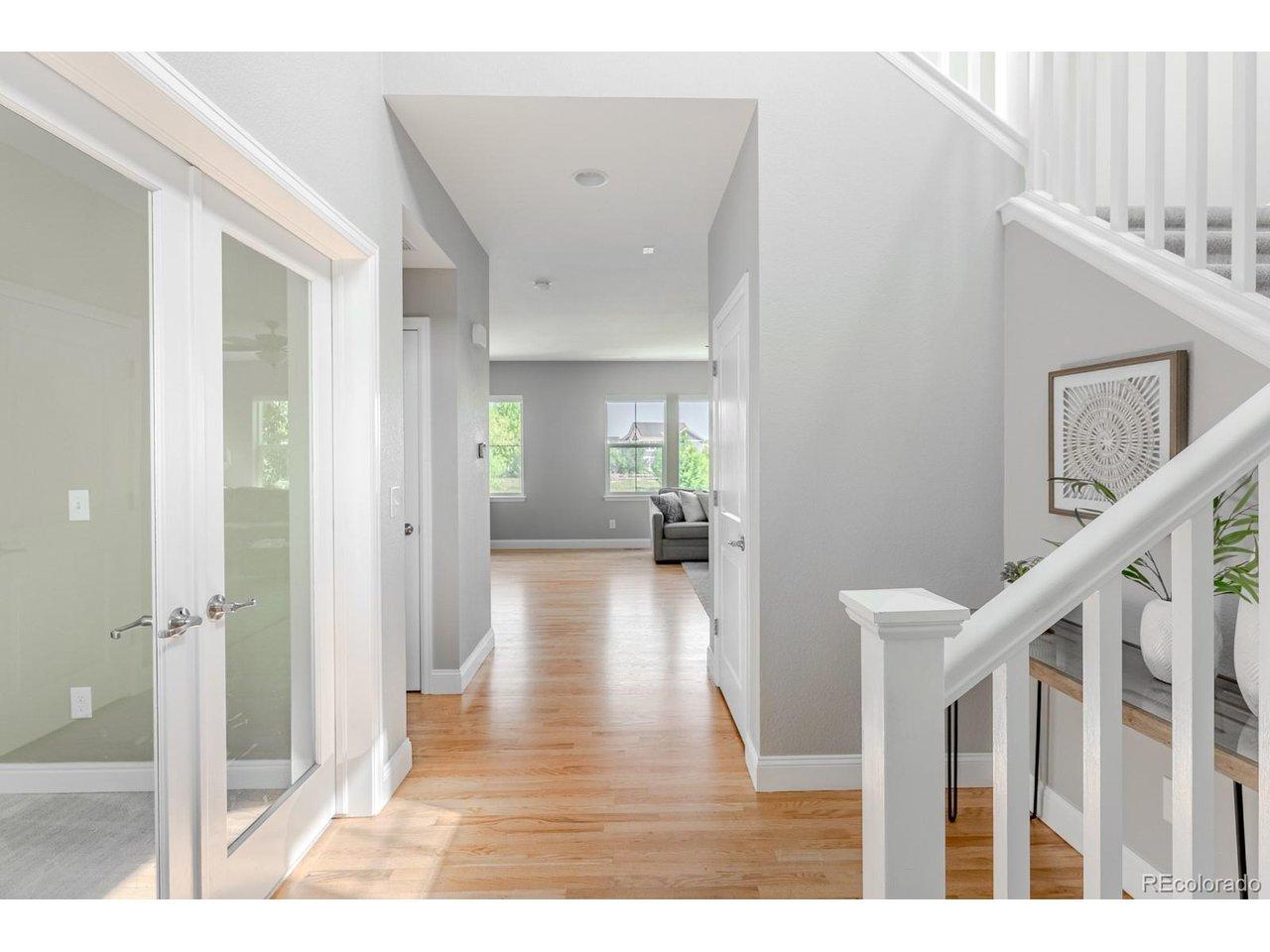 Image 4: Beyond the front door, a dramatic two-story entry introduces a light-filled floorplan designed for both everyday living and effortless entertaining. Image 4: Beyond the front door, a dramatic two-story entry introduces a light-filled floorplan designed for both everyday living and effortless entertaining.