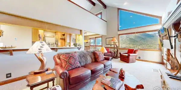 Image 2: Living room with gorgeous views of the mountains. Image 2: Living room with gorgeous views of the mountains.