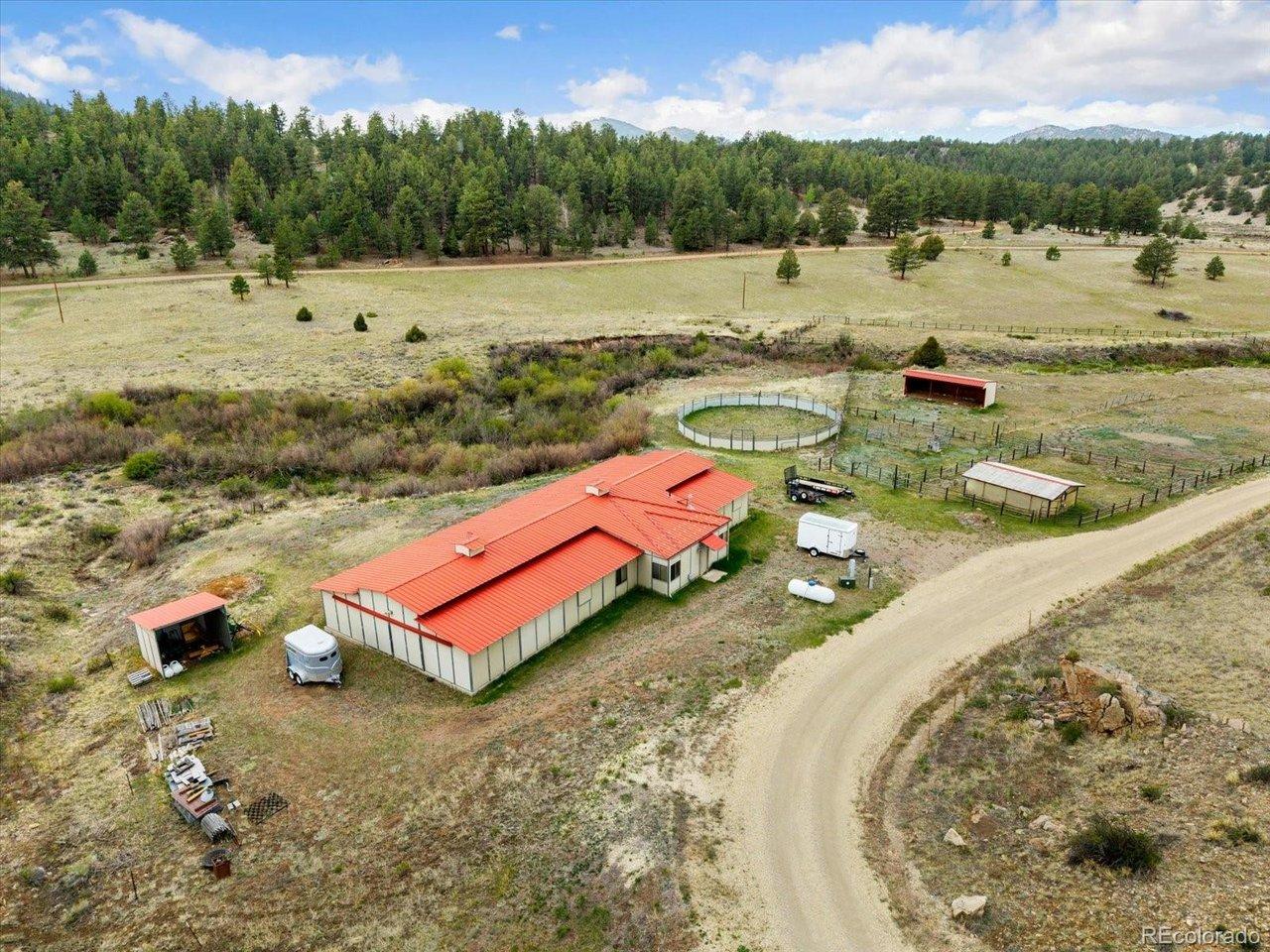 Image 3: Welcome to 40 Bear Ridge Rd, Westcliffe CO -7 stall Horse Barn with 1 bed,1bath apartment, Green house, Round Pen, Hay Shed, loafing Shed and Oak Creek running through the property Image 3: Welcome to 40 Bear Ridge Rd, Westcliffe CO -7 stall Horse Barn with 1 bed,1bath apartment, Green house, Round Pen, Hay Shed, loafing Shed and Oak Creek running through the property