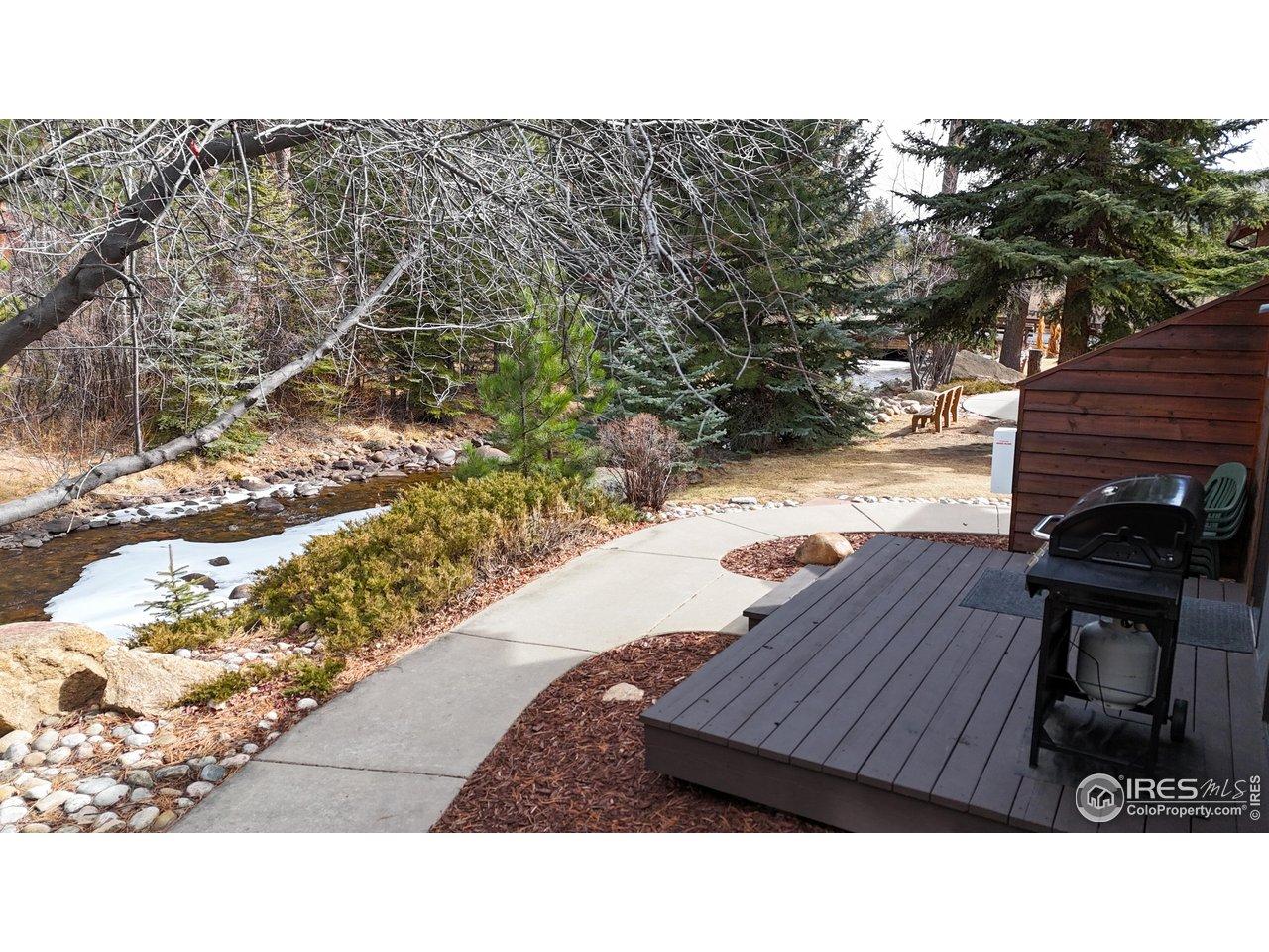 Image 3: Concrete walkway to the deck. Image 3: Concrete walkway to the deck.